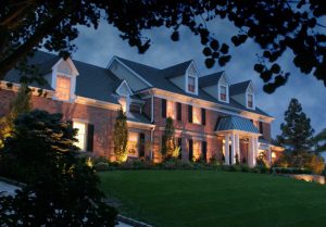 A house with landscape lighting in MA
