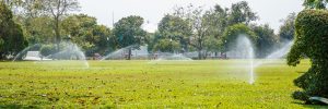 sprinkler system watering lawn